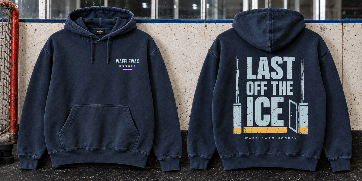 WaffleWax Last Off the Ice hoodie concept in washed navy, front and back views with ice-blue lettering and yellow rink-board accents.